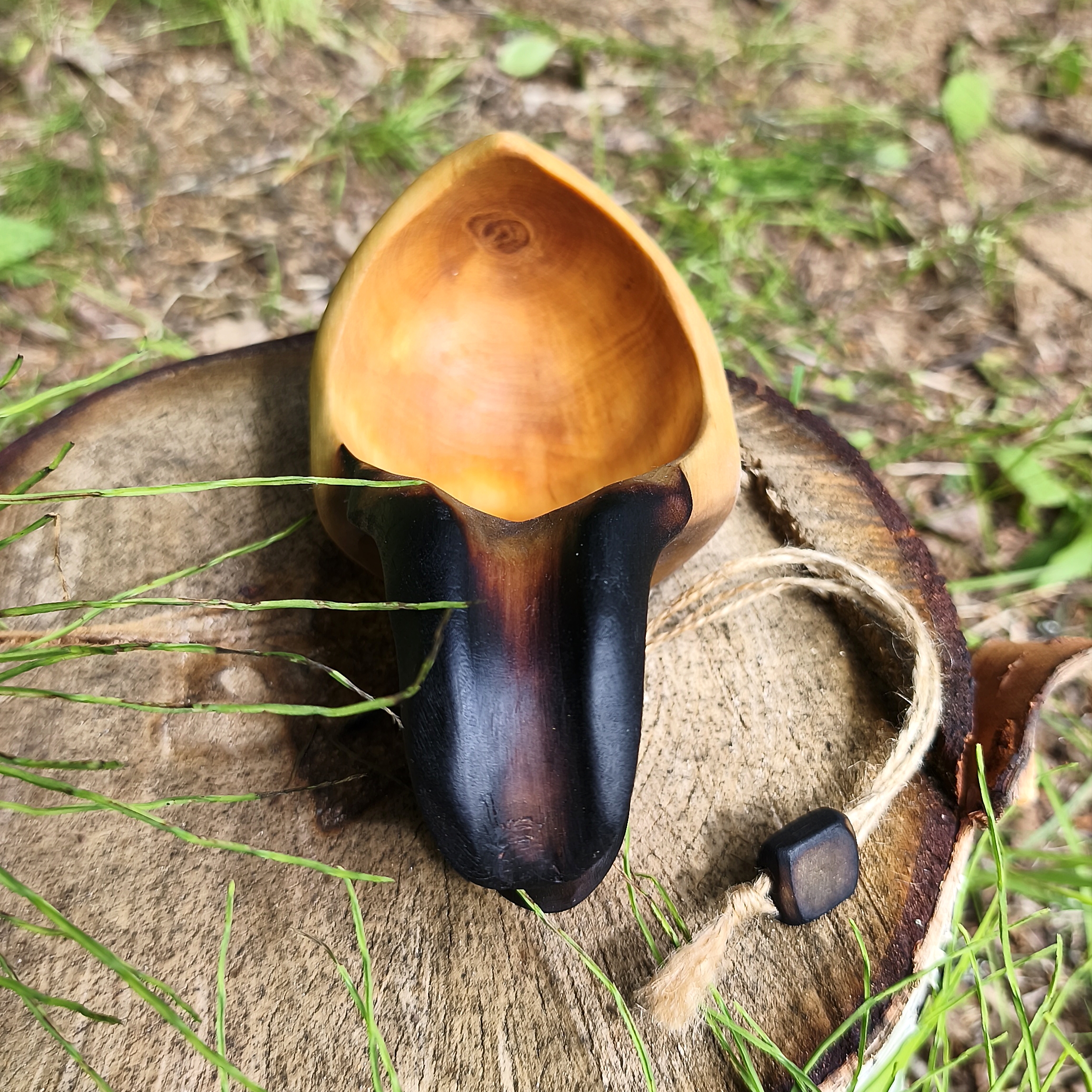 Traditional Scandinavian Kuksa cup made from untreated birch wood with a unique natural grain and rustic finish.