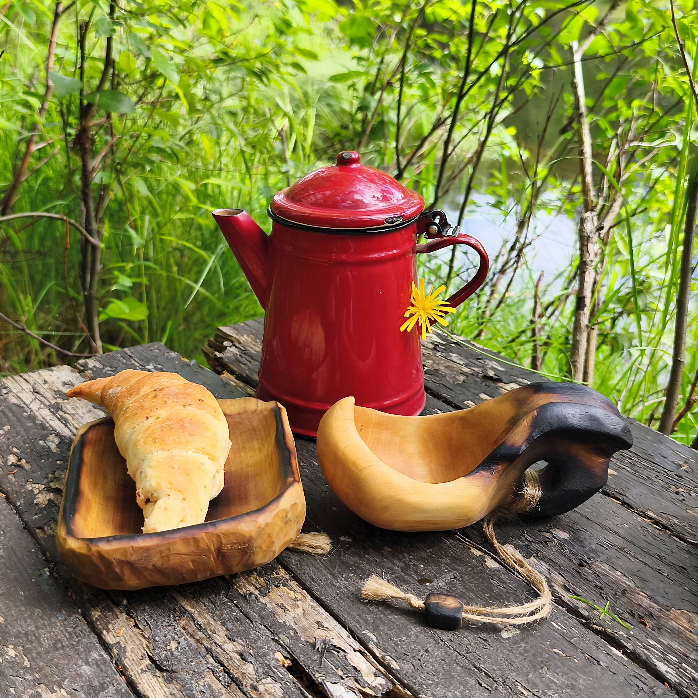 Unique handmade Scandinavian wooden cup with a fire-burned handle and natural birch wood character.
